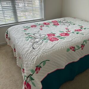 Floral Handmade Quilt with Pink and Green Accents